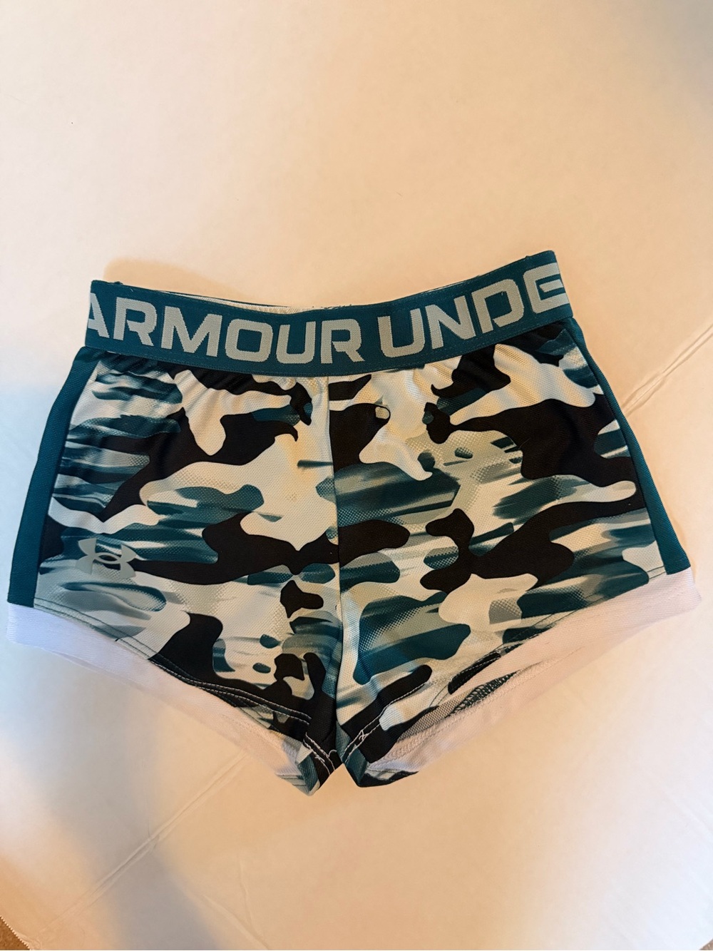 Under Armour girl’s Teal and Black Camo Performance Shorts